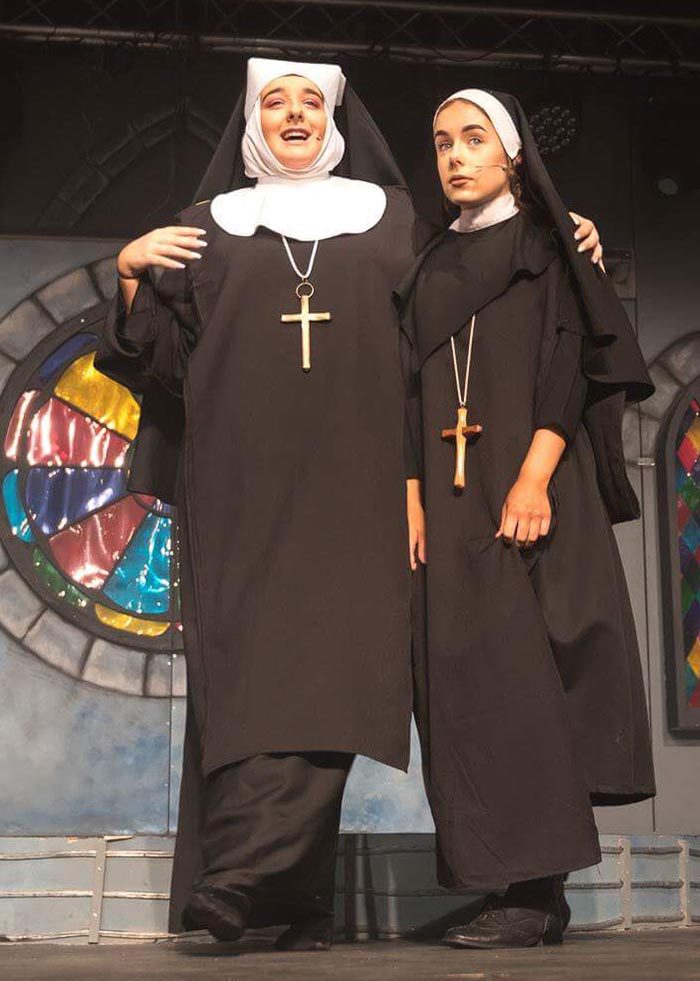 Thespis supply complete set of Black Nuns costumes with white wimple&apos;s, vails, shoes and crosses for Sister Act the Musical.